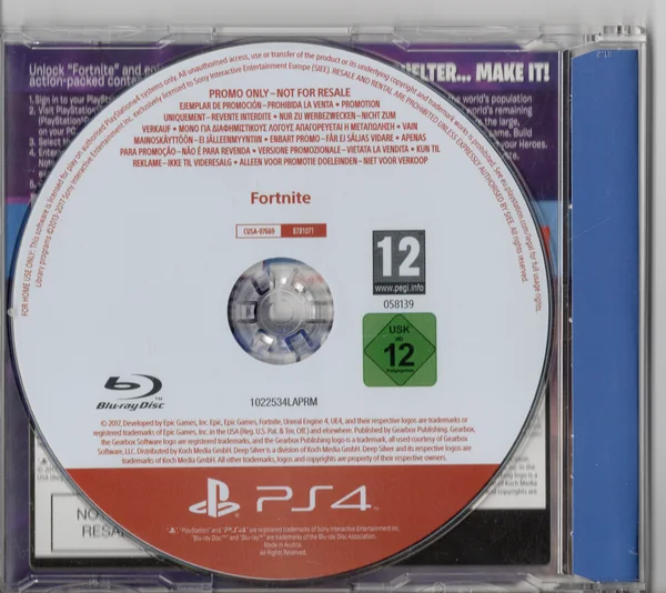 Disco colocado en su caja · reverso parcialmente oculto de Fortnite [Promo Disc] · PAL · Mercado por determinar